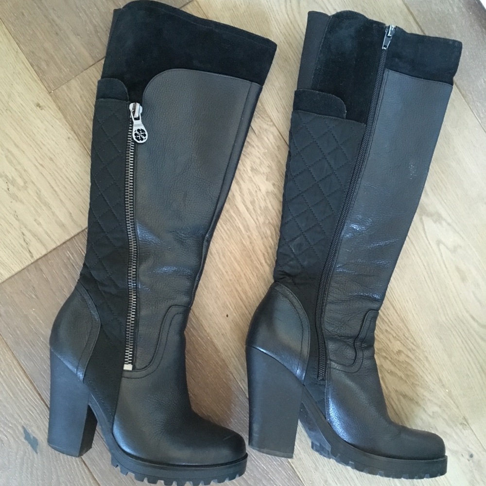 Knee high Guess leather boots.